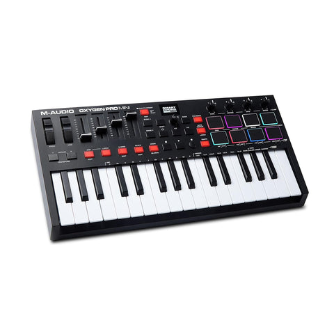 M-Audio Oxygen Pro Mini – 32 Key USB MIDI Keyboard Controller With Beat Pads, MIDI assignable Knobs, Buttons &amp; Faders and Software Suite Included